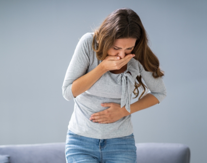 Migraine headache with nausea symptoms